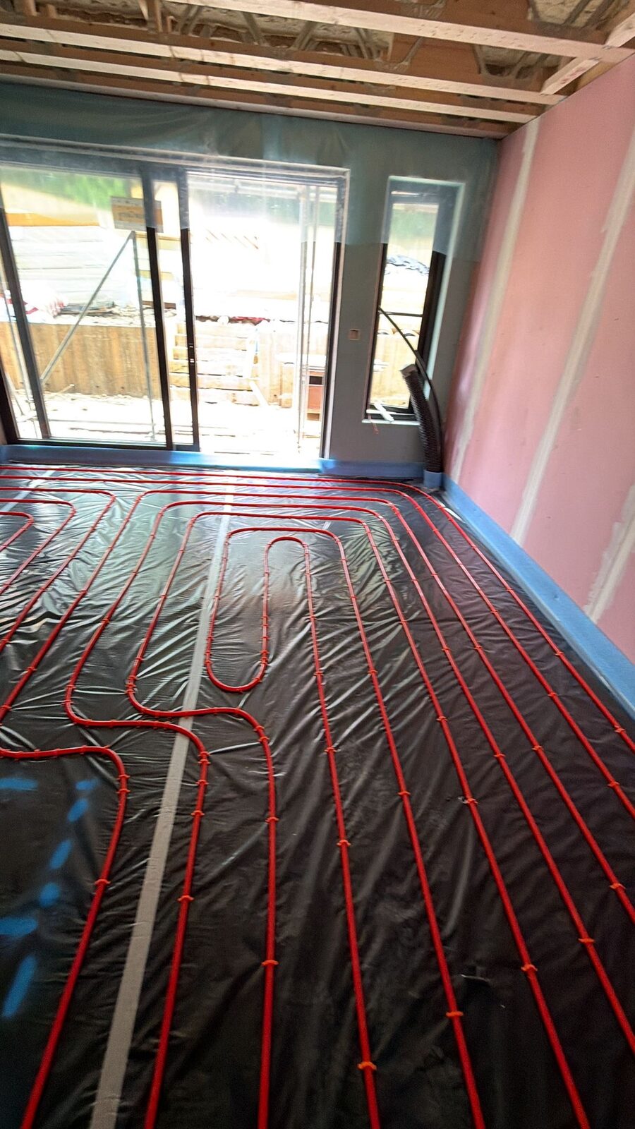 Room-by-room zoned wet underfloor heating in a London renovation